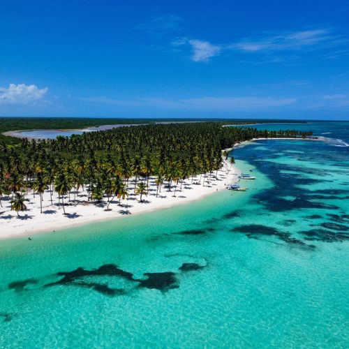 Stunning aerial view of Canto de la Playa with turquoise waters and lush coastline