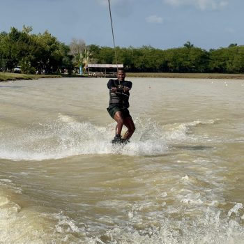 Man waterskiing in a lake in the dominican republic