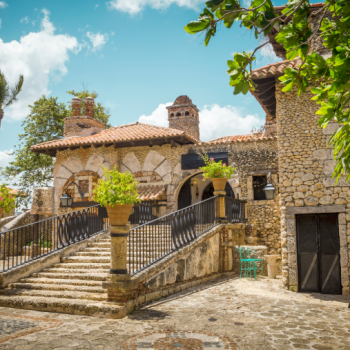 Narrow alley with rustic architecture and greenery in Altos de Chavón
